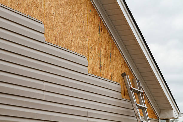 Professional Emergency Siding Repair technician working in Sharpsville, PA